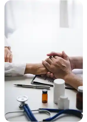 image of doctor and patient holding hands links to Educational Materials